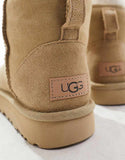https://images.asos-media.com/products/ugg-classic-mini-ii-boots-in-stone/205330889-2?$n_750w$&wid=750&fit=constrain