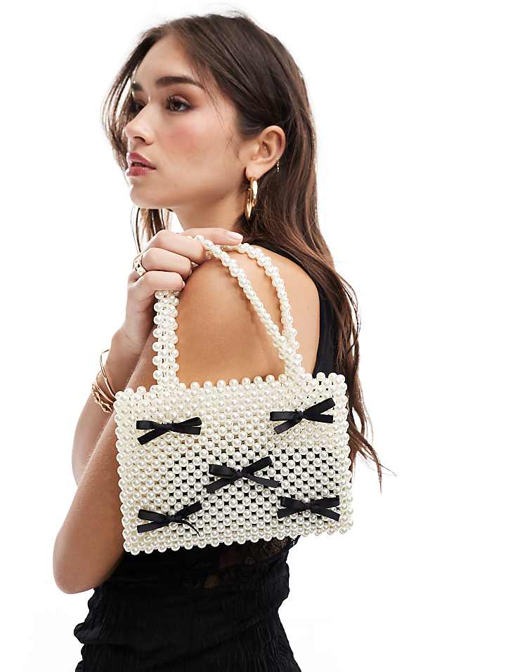 https://images.asos-media.com/products/asos-design-bead-ball-bag-with-mini-bows/206757706-1-cream?$n_750w$&wid=750&fit=constrain