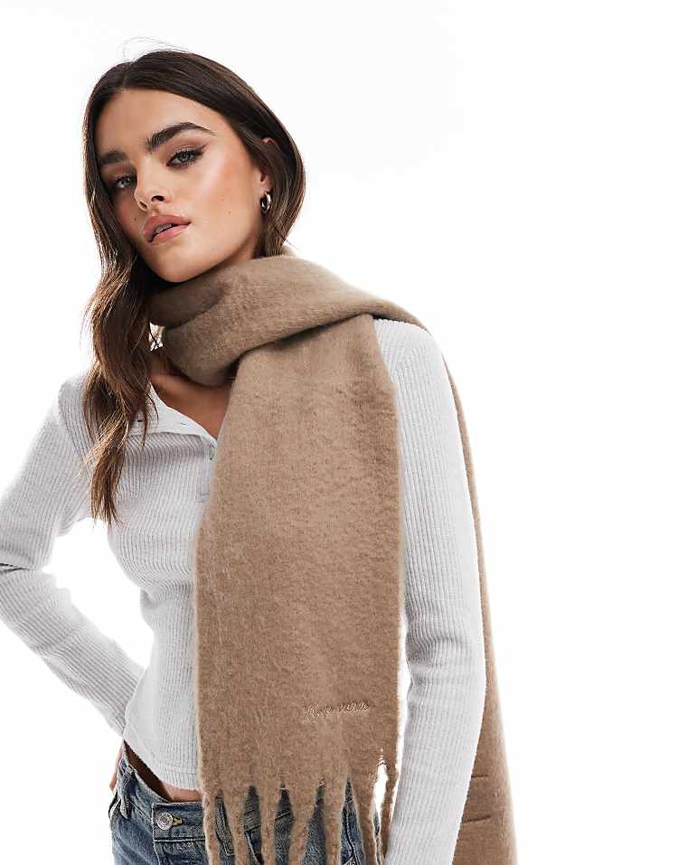 https://images.asos-media.com/products/pieces-medium-super-soft-tassel-scarf-in-beige/207131784-1-fossil?$n_750w$&wid=750&fit=constrain