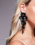 https://images.asos-media.com/products/asos-design-drop-earrings-with-3d-floral-design-in-black/207385455-1-black?$n_750w$&wid=750&fit=constrain