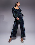 https://images.asos-media.com/products/asos-design-long-sleeve-ruffle-off-shoulder-jumpsuit-in-blurred-floral-print/207547856-3?$n_750w$&wid=750&fit=constrain