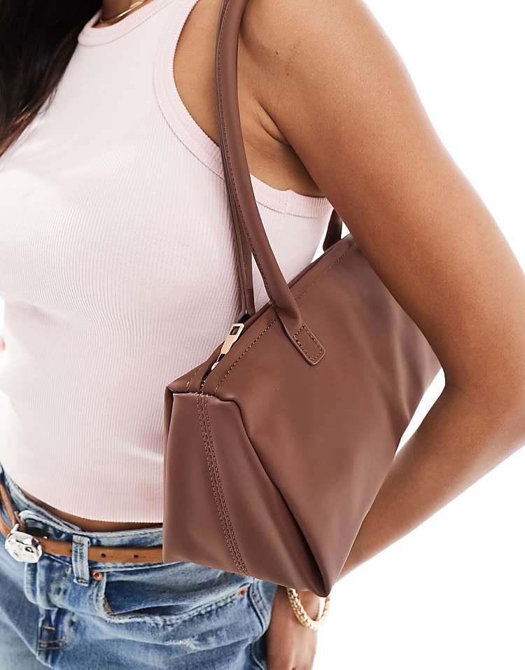 https://images.asos-media.com/products/glamorous-slouchy-long-shoulder-bag-in-brown/207705992-2?$n_750w$&wid=750&fit=constrain