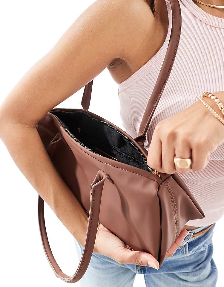 https://images.asos-media.com/products/glamorous-slouchy-long-shoulder-bag-in-brown/207705992-4?$n_750w$&wid=750&fit=constrain