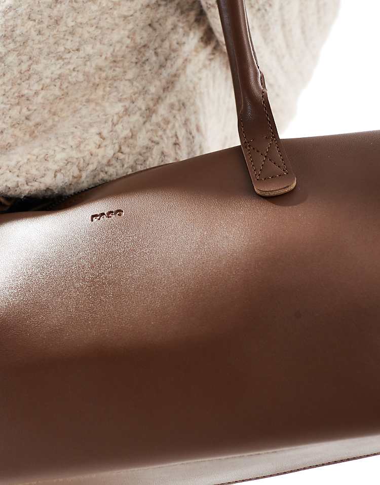 https://images.asos-media.com/products/pasq-long-shoulder-bag-in-brown/207896652-3?$n_750w$&wid=750&fit=constrain