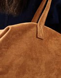 https://images.asos-media.com/products/pasq-faux-suede-long-shoulder-bag-in-tan/207896670-4?$n_750w$&wid=750&fit=constrain