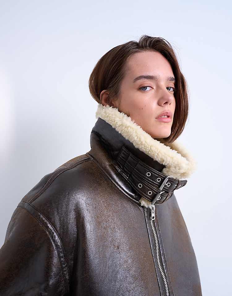 https://images.asos-media.com/products/topshop-oversized-tab-detail-shearling-bomber-in-brown/208044394-3?$n_750w$&wid=750&fit=constrain