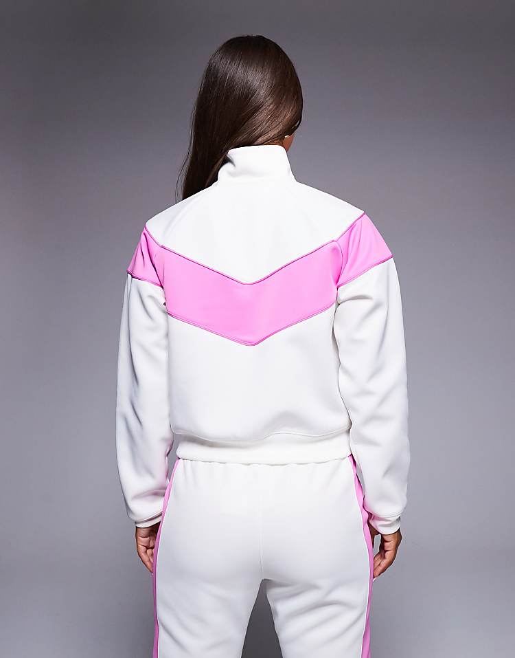https://images.asos-media.com/products/nike-windrunner-polyknit-track-jacket-in-white-and-pink/208074409-4?$n_750w$&wid=750&fit=constrain