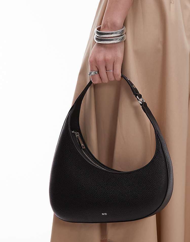 https://images.asos-media.com/products/jw-pei-harlee-asymmetric-shoulder-bag-in-black/208138203-2?$n_750w$&wid=750&fit=constrain