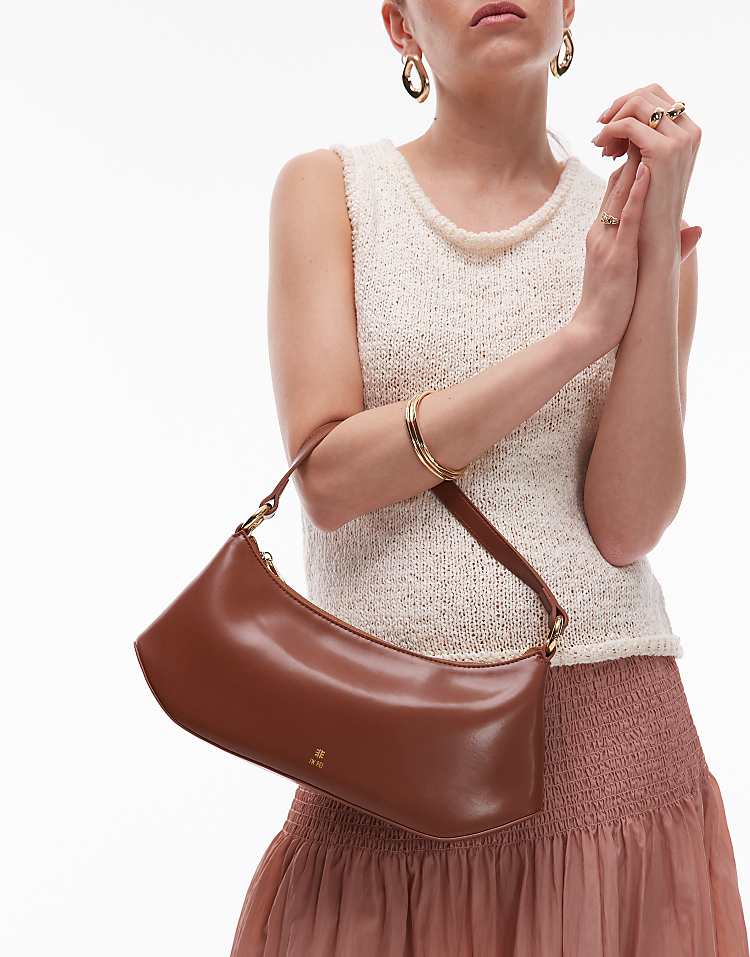 https://images.asos-media.com/products/jw-pei-curved-shoulder-bag-in-brown/208138239-2?$n_750w$&wid=750&fit=constrain