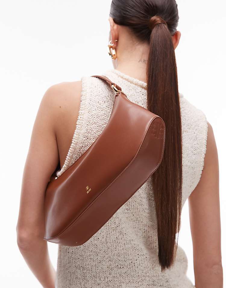 https://images.asos-media.com/products/jw-pei-curved-shoulder-bag-in-brown/208138239-3?$n_750w$&wid=750&fit=constrain