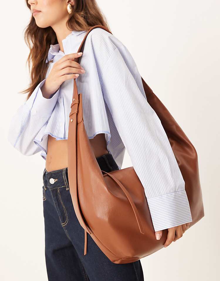 https://images.asos-media.com/products/asos-design-large-sling-tote-bag-in-tan/208388270-1-tan?$n_750w$&wid=750&fit=constrain