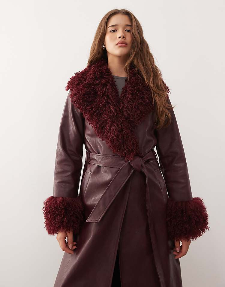 https://images.asos-media.com/products/reclaimed-vintage-longline-leather-look-trench-coat-with-faux-fur-collar-and-cuffs-in-burgundy/208389425-3?$n_750w$&wid=750&fit=constrain