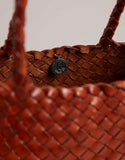 https://images.asos-media.com/products/dragon-diffusion-santa-croce-small-woven-leather-bag-in-tan/208409506-5?$n_750w$&wid=750&fit=constrain