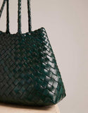 https://images.asos-media.com/products/dragon-diffusion-santa-croce-small-woven-leather-bag-in-dark-green/208409516-4?$n_750w$&wid=750&fit=constrain