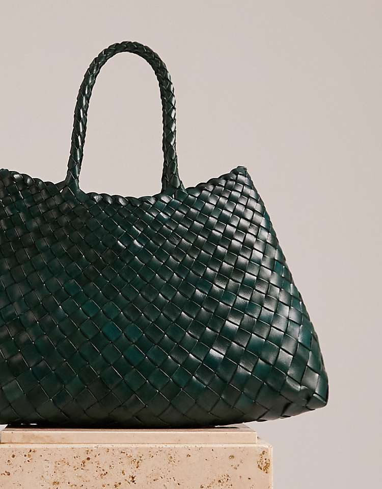 https://images.asos-media.com/products/dragon-diffusion-santa-croce-small-woven-leather-bag-in-dark-green/208409516-5?$n_750w$&wid=750&fit=constrain