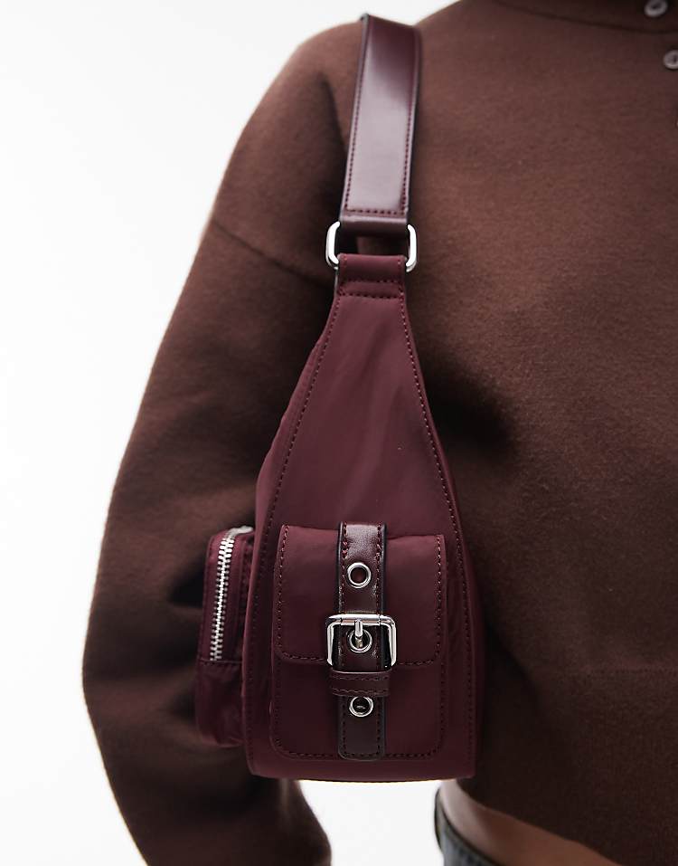 https://images.asos-media.com/products/topshop-sunrise-pocket-shoulder-nylon-bag-in-burgundy/208433495-2?$n_750w$&wid=750&fit=constrain