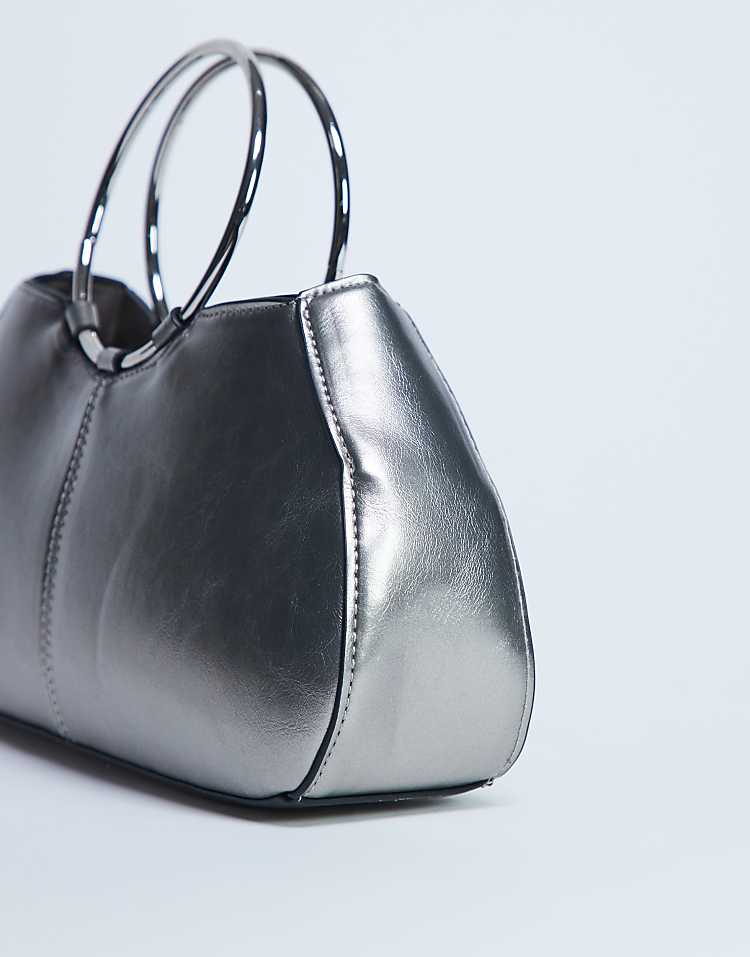 https://images.asos-media.com/products/topshop-griffith-metal-ring-handle-grab-bag-in-silver/208433501-3?$n_750w$&wid=750&fit=constrain