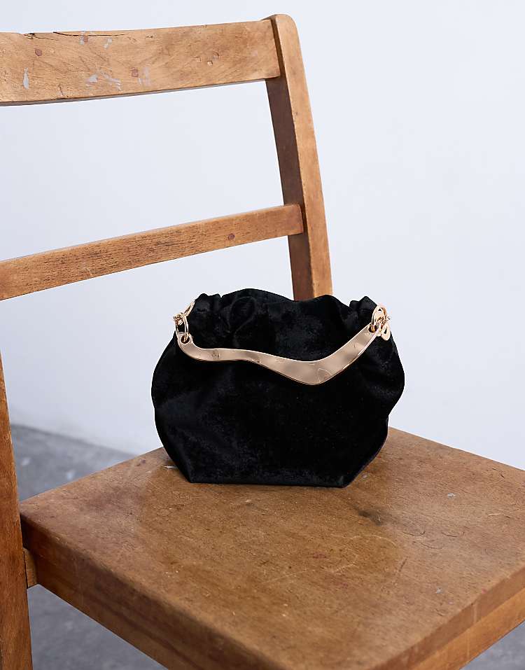 https://images.asos-media.com/products/topshop-gabriette-velvet-metal-trim-handle-grab-bag-in-black/208460770-2?$n_750w$&wid=750&fit=constrain