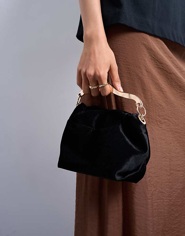 https://images.asos-media.com/products/topshop-gabriette-velvet-metal-trim-handle-grab-bag-in-black/208460770-3?$n_750w$&wid=750&fit=constrain