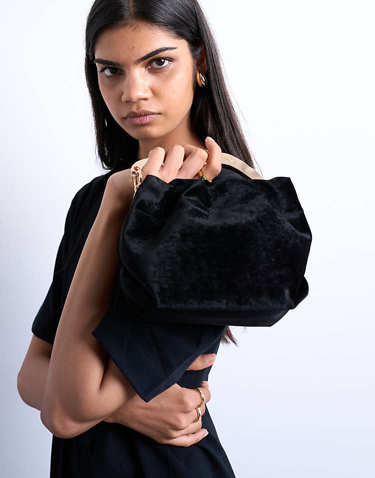 https://images.asos-media.com/products/topshop-gabriette-velvet-metal-trim-handle-grab-bag-in-black/208460770-4?$n_750w$&wid=750&fit=constrain