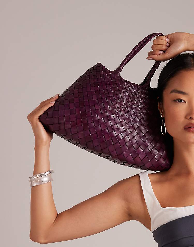 https://images.asos-media.com/products/dragon-diffusion-santa-croce-small-woven-leather-bag-in-plum/208481399-1-purple?$n_750w$&wid=750&fit=constrain