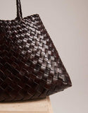 https://images.asos-media.com/products/dragon-diffusion-santa-croce-small-woven-leather-bag-in-dark-brown/208481421-5?$n_750w$&wid=750&fit=constrain