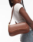 https://images.asos-media.com/products/jw-pei-joy-shoulder-bag-in-brown/208588891-1-brown?$n_750w$&wid=750&fit=constrain