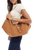 https://images.asos-media.com/products/stradivarius-slouchy-faux-suede-buckle-detail-bag-in-tan/208635322-1-brown?$n_750w$&wid=750&fit=constrain