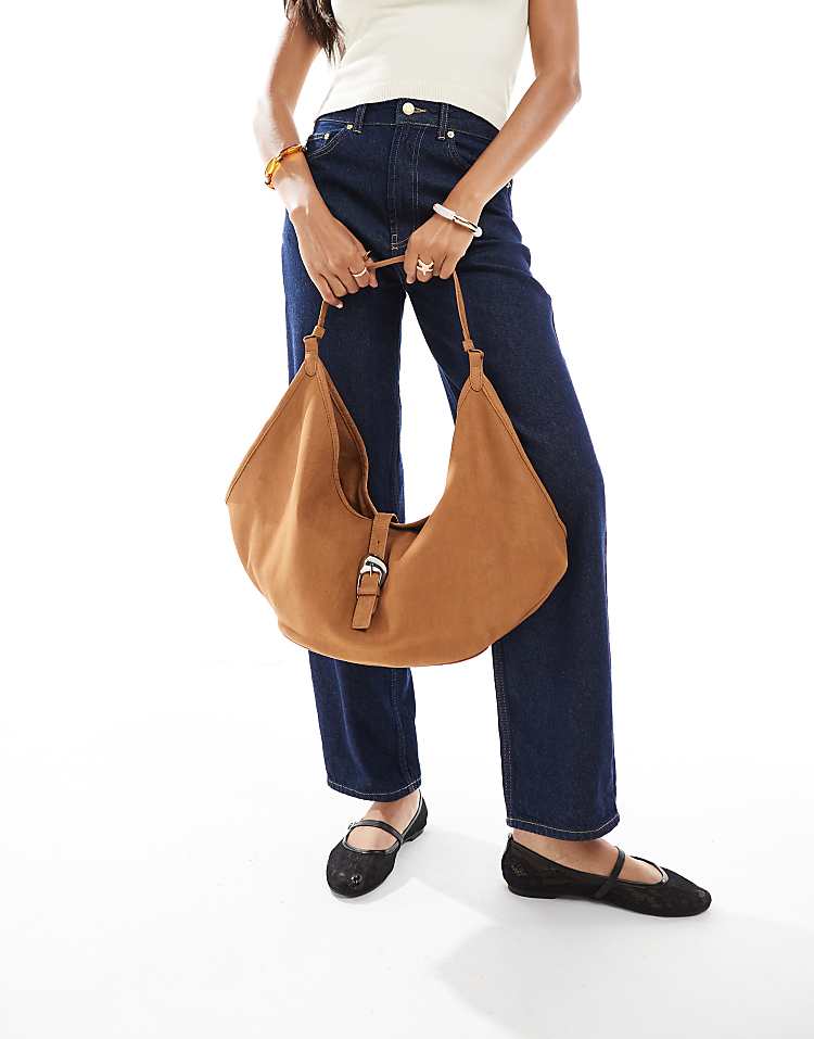 https://images.asos-media.com/products/stradivarius-slouchy-faux-suede-buckle-detail-bag-in-tan/208635322-3?$n_750w$&wid=750&fit=constrain