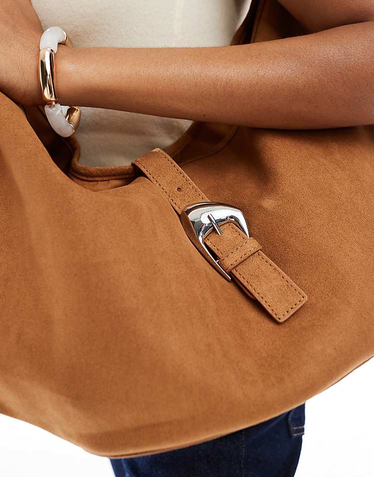 https://images.asos-media.com/products/stradivarius-slouchy-faux-suede-buckle-detail-bag-in-tan/208635322-4?$n_750w$&wid=750&fit=constrain