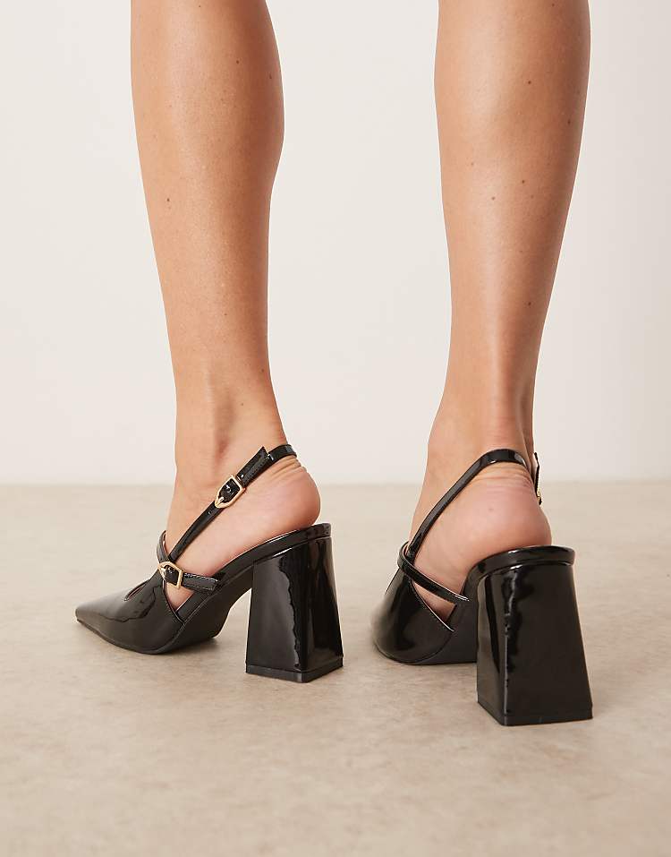 https://images.asos-media.com/products/raid-wide-fit-siya-block-heeled-shoes-with-pointed-toe-in-black-patent/208657501-3?$n_750w$&wid=750&fit=constrain