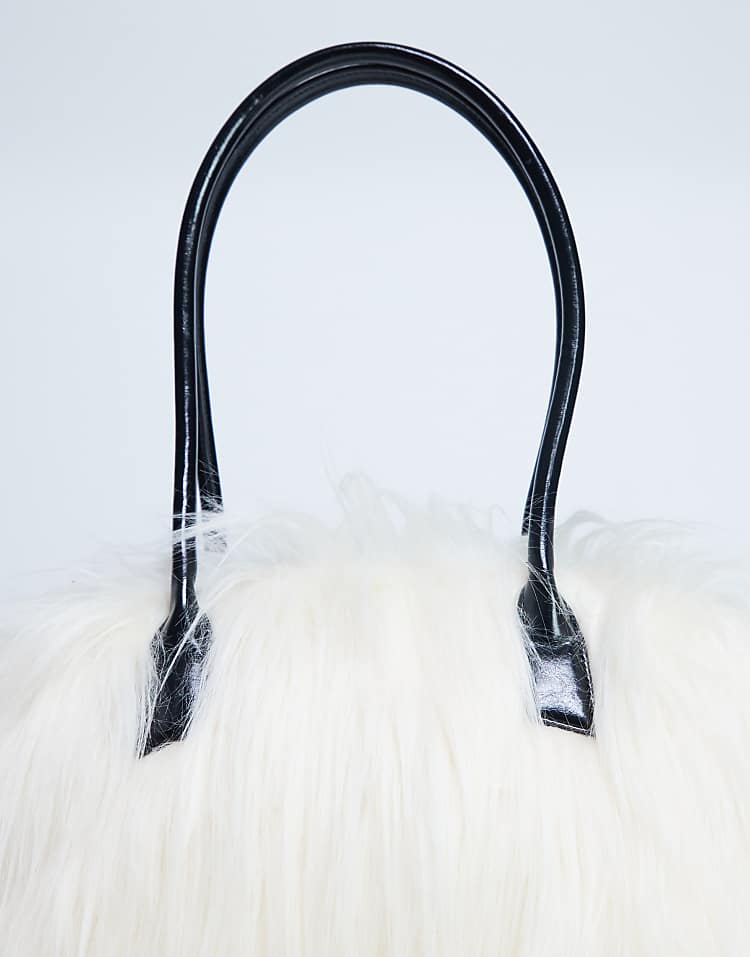 https://images.asos-media.com/products/topshop-shaggy-faux-fur-shoulder-bag-in-off-white/208709230-2?$n_750w$&wid=750&fit=constrain