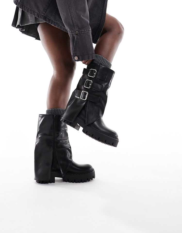 https://images.asos-media.com/products/seqwl-wide-fit-stella-buckle-detail-chunky-boots-in-black/208726957-1-black?$n_750w$&wid=750&fit=constrain