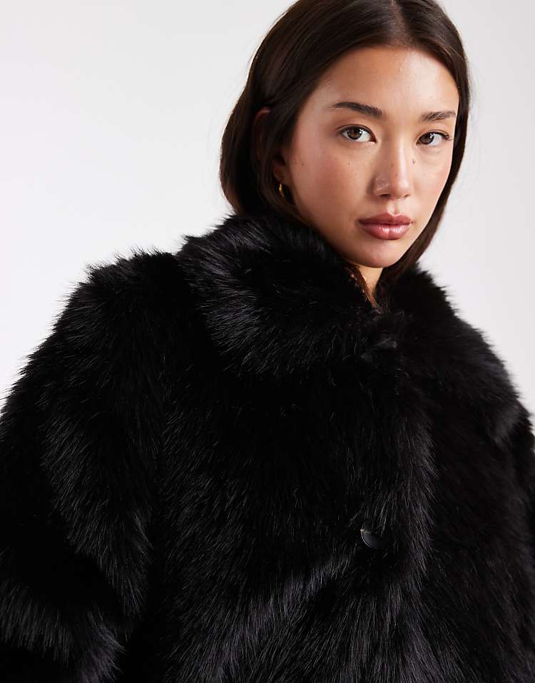 https://images.asos-media.com/products/asos-design-longline-tipped-faux-fur-car-coat-in-black/208747495-3?$n_750w$&wid=750&fit=constrain