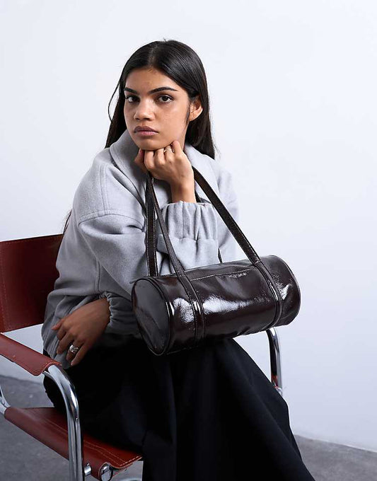 https://images.asos-media.com/products/topshop-salma-bowler-bag-in-chocolate-patent/208782182-1-chocolate?$n_750w$&wid=750&fit=constrain