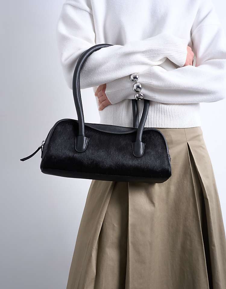 https://images.asos-media.com/products/topshop-sullivan-leather-shoulder-bowler-bag-in-black-pony/208819143-4?$n_750w$&wid=750&fit=constrain