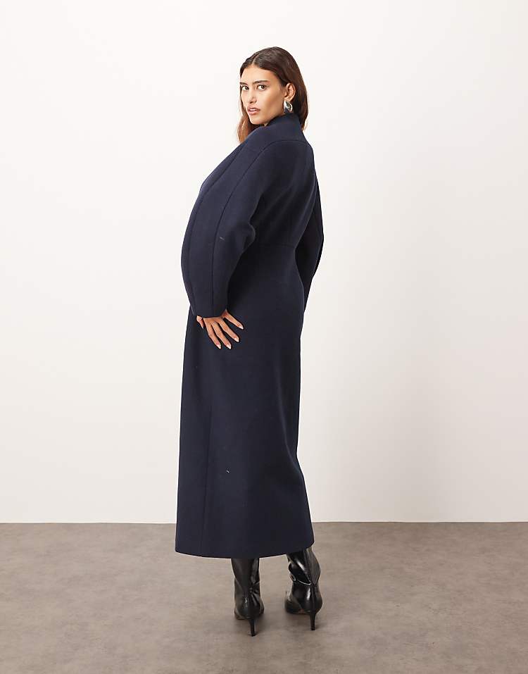 https://images.asos-media.com/products/arrange-wool-mix-cinched-waist-ovoid-sleeve-coat-in-navy/208827129-4?$n_750w$&wid=750&fit=constrain