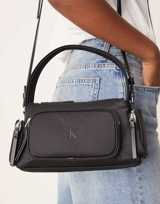 https://images.asos-media.com/products/calvin-klein-nylon-pocket-shoulder-bag-in-black/208894583-1-black?$n_750w$&wid=750&fit=constrain
