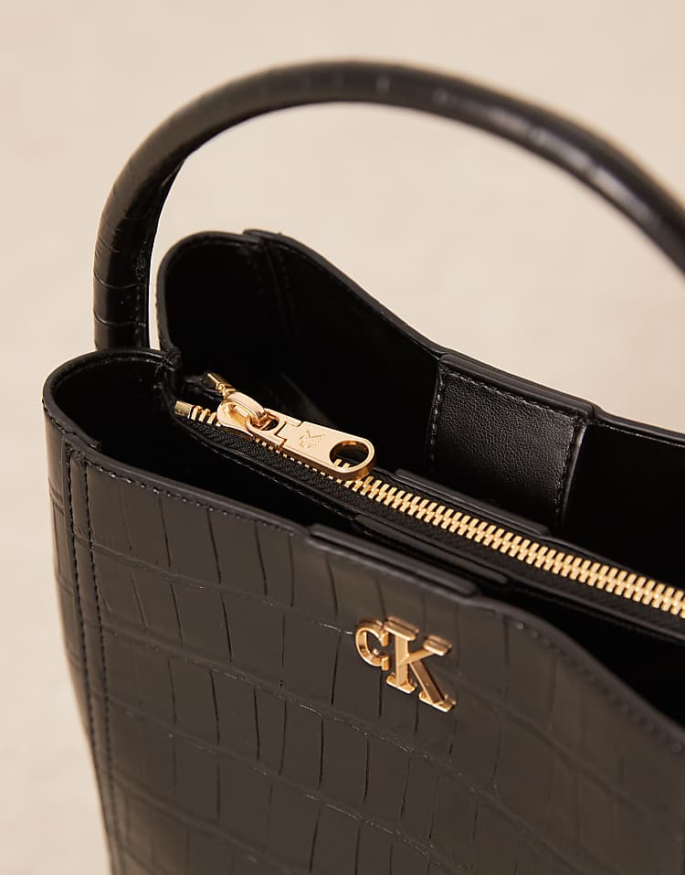 https://images.asos-media.com/products/calvin-klein-leather-croc-bucket-bag-in-black/208894613-4?$n_750w$&wid=750&fit=constrain