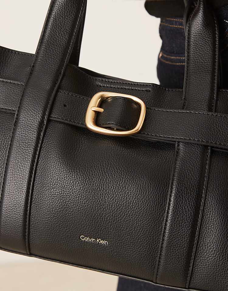 https://images.asos-media.com/products/calvin-klein-leather-buckle-mini-tote-bag-in-black/208894683-4?$n_750w$&wid=750&fit=constrain