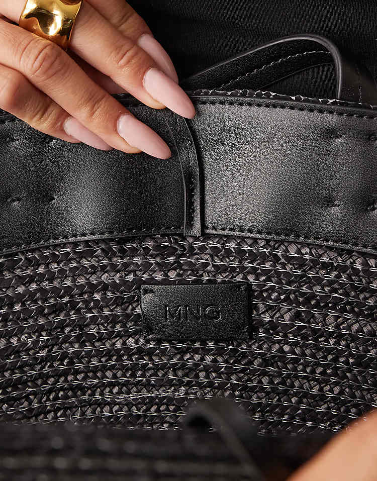 https://images.asos-media.com/products/mango-woven-straw-bag-with-flower-charm-in-black/208896101-4?$n_750w$&wid=750&fit=constrain