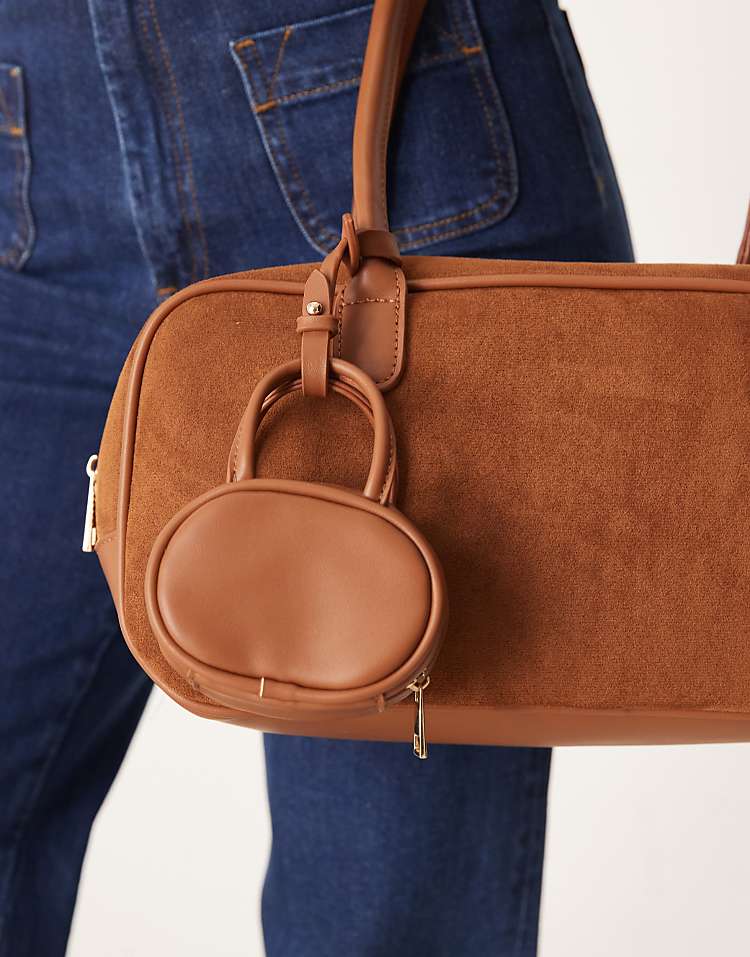 https://images.asos-media.com/products/asos-design-faux-suede-large-bowler-tote-bag-with-mini-bowler-bag-in-tan/208933353-4?$n_750w$&wid=750&fit=constrain