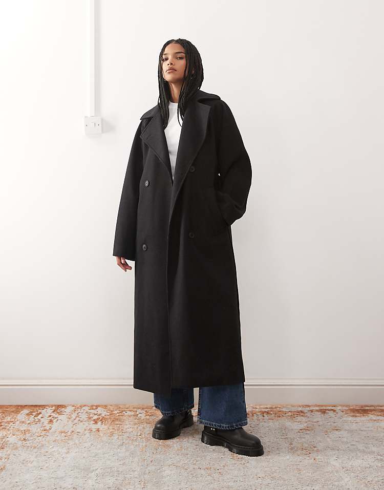https://images.asos-media.com/products/weekday-kia-wool-blend-oversized-coat-with-tie-waist-detail-in-black/209080855-1-black?$n_750w$&wid=750&fit=constrain