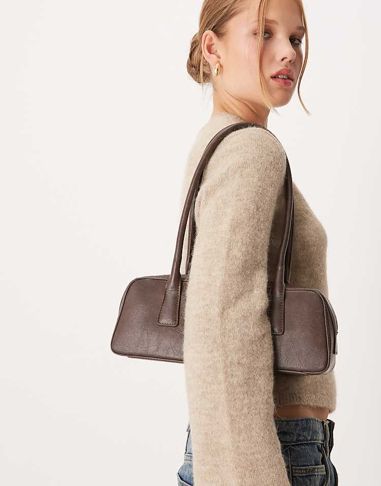 https://images.asos-media.com/products/gina-tricot-small-bowling-two-handle-shoulder-bag-in-washed-brown/209114745-3?$n_750w$&wid=750&fit=constrain