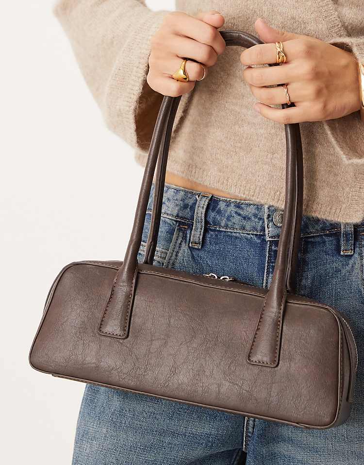 https://images.asos-media.com/products/gina-tricot-small-bowling-two-handle-shoulder-bag-in-washed-brown/209114745-4?$n_750w$&wid=750&fit=constrain