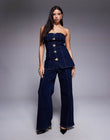 https://images.asos-media.com/products/river-island-flower-button-detail-denim-jumpsuit-in-dark-denim/209151716-1-blue?$n_750w$&wid=750&fit=constrain