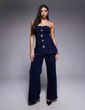 https://images.asos-media.com/products/river-island-flower-button-detail-denim-jumpsuit-in-dark-denim/209151716-1-blue?$n_750w$&wid=750&fit=constrain