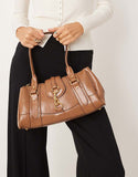 https://images.asos-media.com/products/mango-retro-bowler-shoulder-bag-with-clasp-detail-in-toffee/209160668-2?$n_750w$&wid=750&fit=constrain