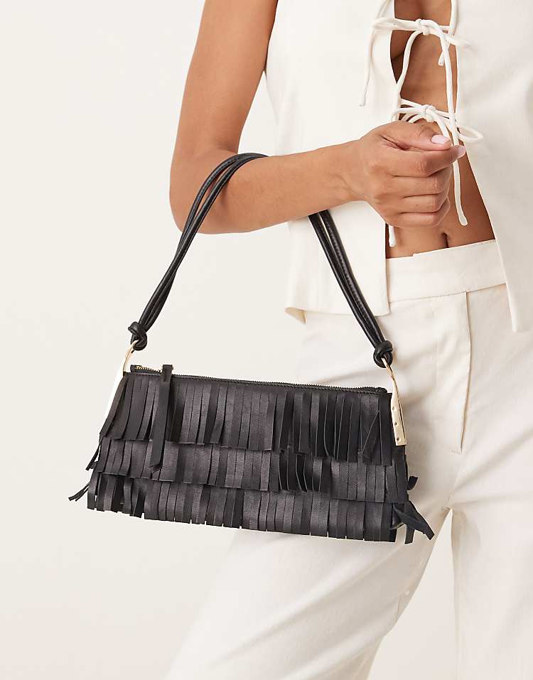 https://images.asos-media.com/products/mango-leather-fringed-hand-bag-with-gold-accents-in-black/209160892-3?$n_750w$&wid=750&fit=constrain