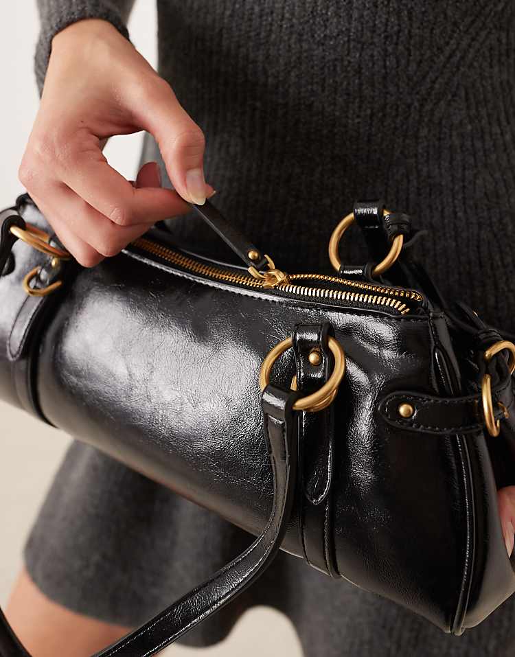 https://images.asos-media.com/products/mango-faux-leather-bowling-bag-with-lock-in-black/209260828-4?$n_750w$&wid=750&fit=constrain